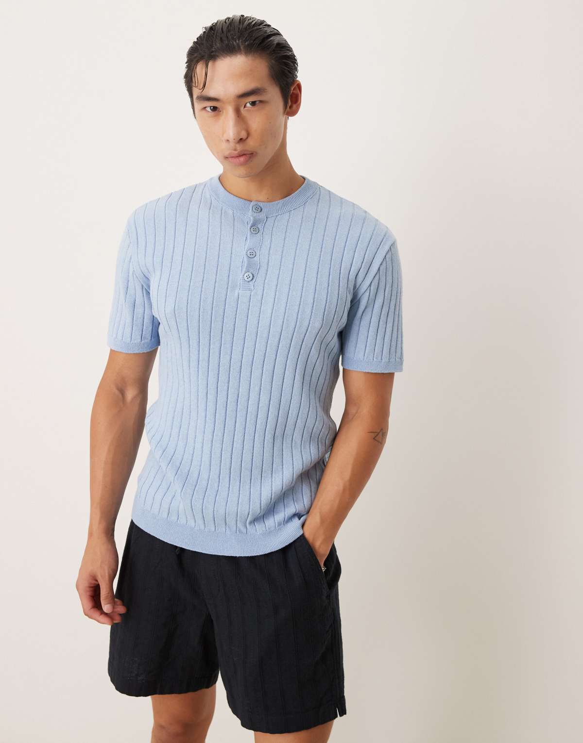 ASOS DESIGN muscle fit knitted henley neck t-shirt in light blue