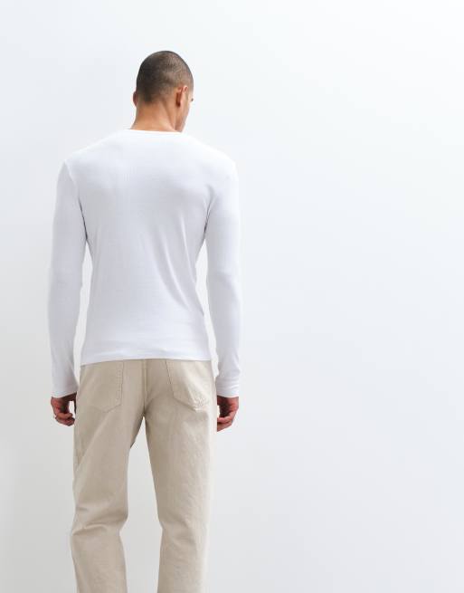 ASOS DESIGN muscle fit long sleeve t-shirt with embroidered chest emblem in white rib, 3 of 5