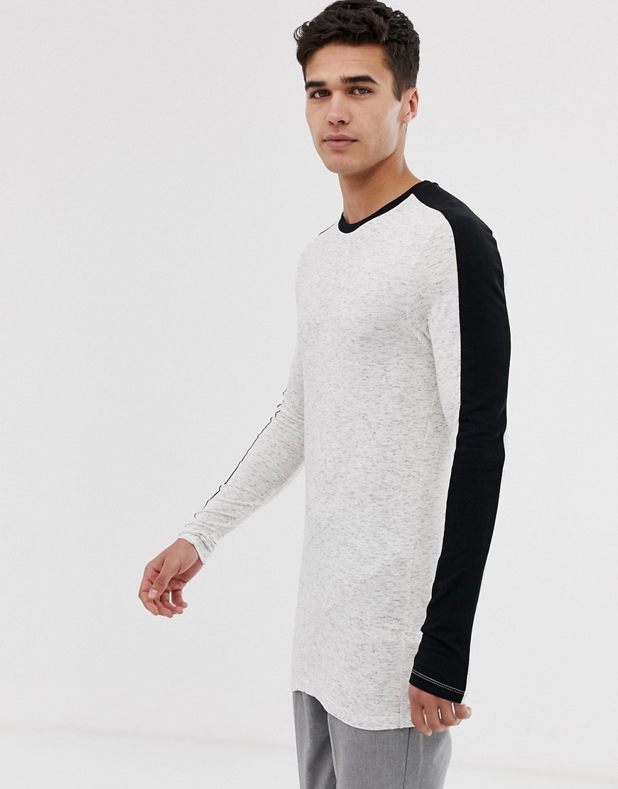 ASOS DESIGN muscle fit longline long sleeve t-shirt with sleeve panel in interest fabric-White