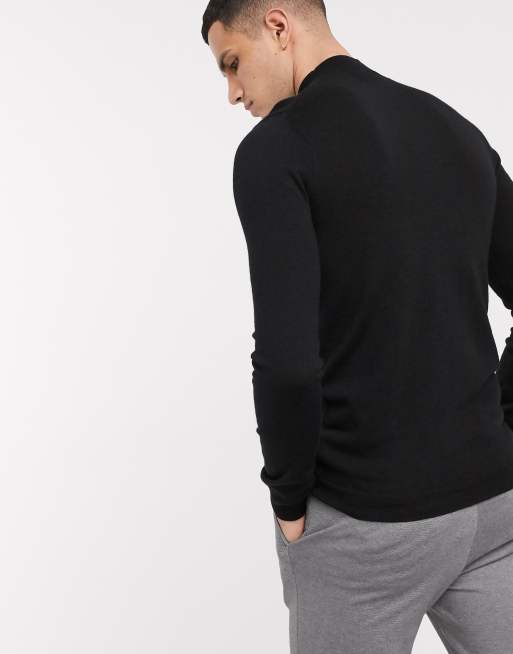 ASOS DESIGN muscle fit merino wool turtle neck jumper in black