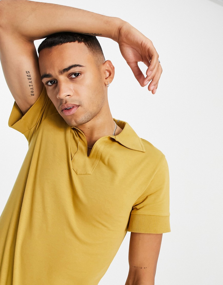 ASOS DESIGN muscle fit polo with revere collar in mustard-Yellow