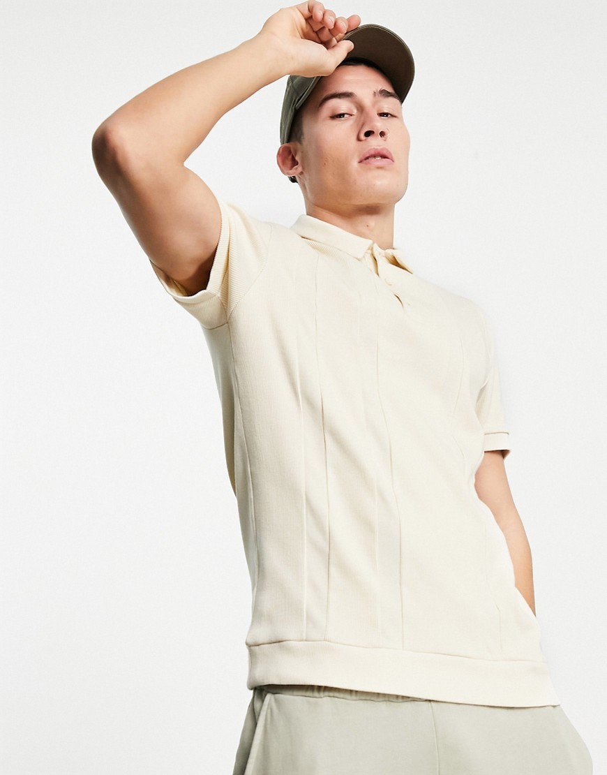 ASOS DESIGN muscle fit polo with waffle cut & sew panels in beige-Neutral