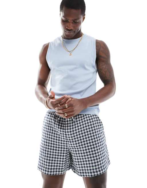 ASOS DESIGN muscle fit singlet with panel detail in light blue