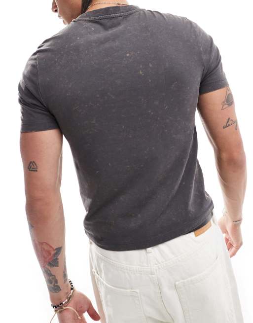 ASOS DESIGN muscle fit t-shirt in black with grunge front print