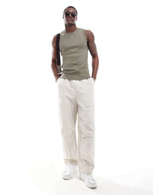 ASOS DESIGN muscle fit tank top with panel detail in khaki