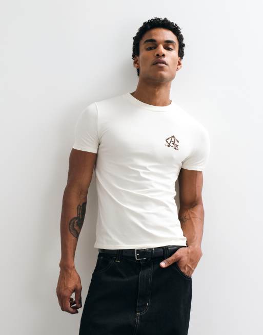 ASOS DESIGN muscle-t-shirt med brösttryck i creme, 2 av 9