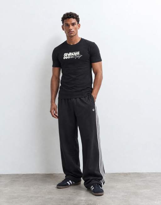 ASOS DESIGN muscle-t-shirt med Shibuya-tryck i svart, 7 av 9