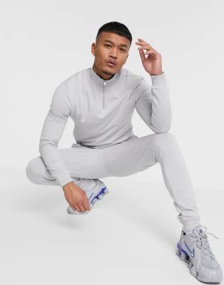 light grey tracksuit