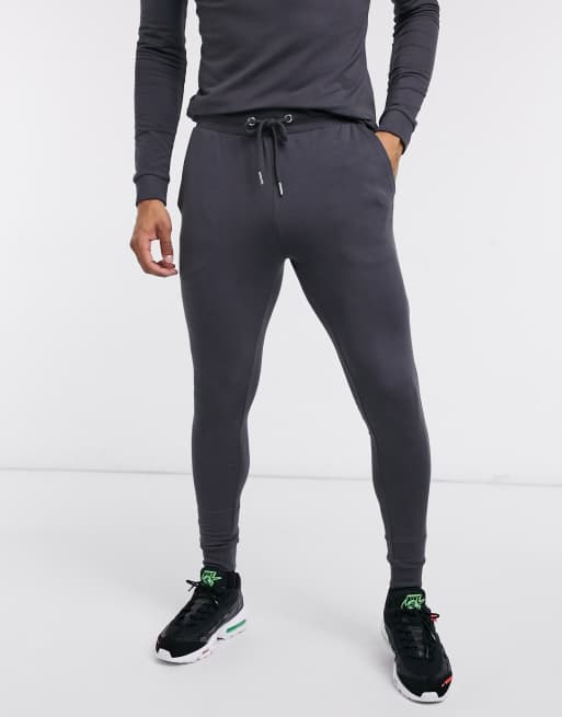ASOS DESIGN muscle tracksuit with half zip sweatshirt in washed black