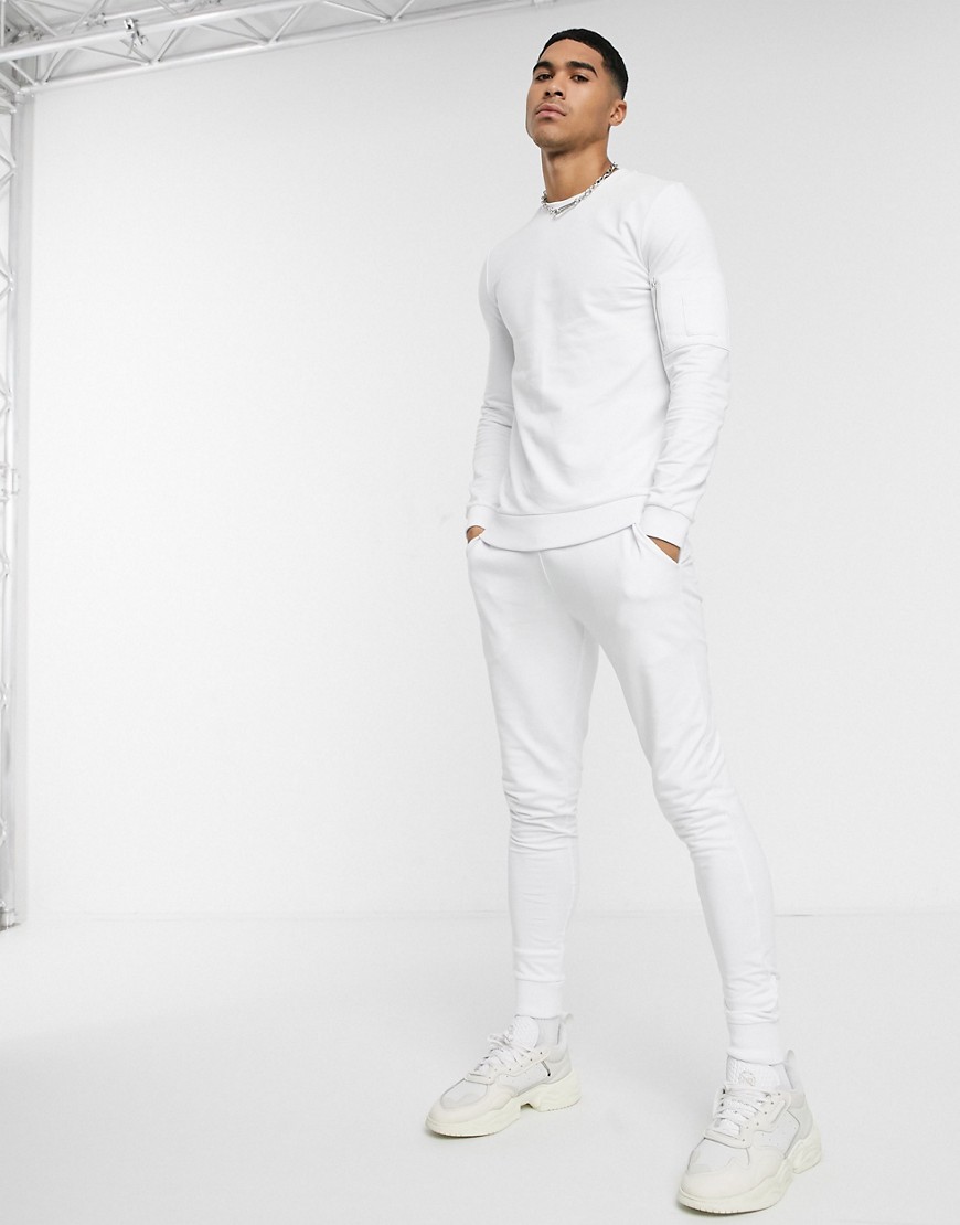 ASOS DESIGN muscle tracksuit with MA1 pockets in white