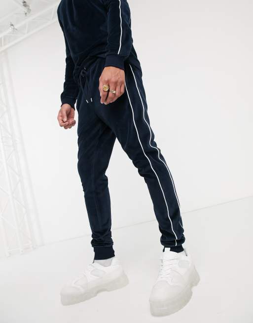 ASOS DESIGN muscle tracksuit with piping in navy velour