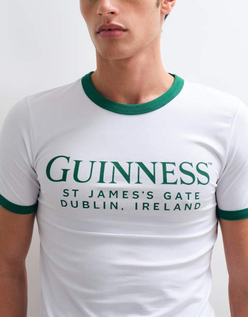 ASOS DESIGN Muskelshirt mit Ringer-Ausschnitt und Guinness-Print in Weiß, 3 von 5