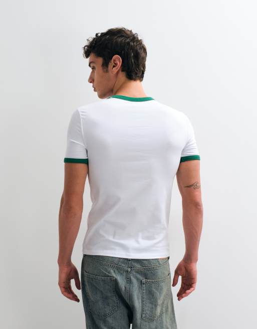 ASOS DESIGN Muskelshirt mit Ringer-Ausschnitt und Guinness-Print in Weiß, 5 von 5