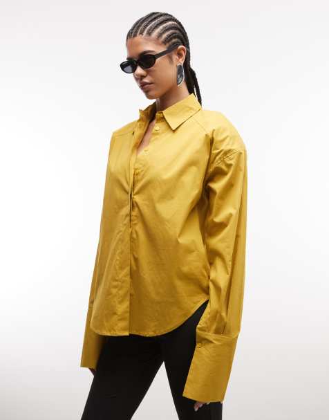 ASOS DESIGN – Musztardowa koszula z poduszkami na ramionach i obniżonym dołem - view 1