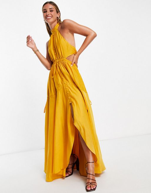 ASOS DESIGN – Musztardowa sukienka maxi z dekoltem typu halter, zapięciem  na guziki i warstwową spódnicą | ASOS