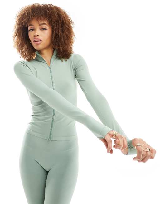 ASOS DESIGN - Naadloze, corrigerende top met lange mouwen en ritssluiting in saliegroen, deel van co-ord set