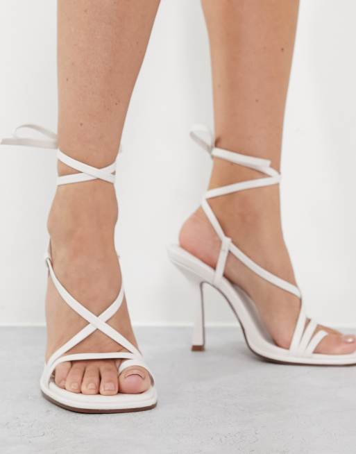 ASOS DESIGN Nash strappy tie leg heeled sandals in off white