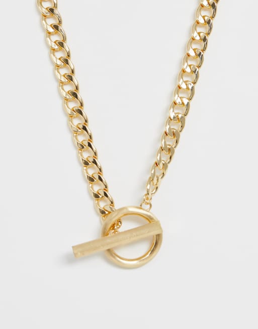 ASOS DESIGN - Naszyjnik łańcuchowy w kolorze złota z okrągłym wisiorkiem w kształcie przetyczki 