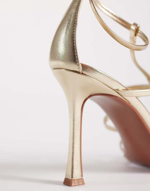 ASOS DESIGN Natalia caged T bar high heel sandals in gold, 3 of 5