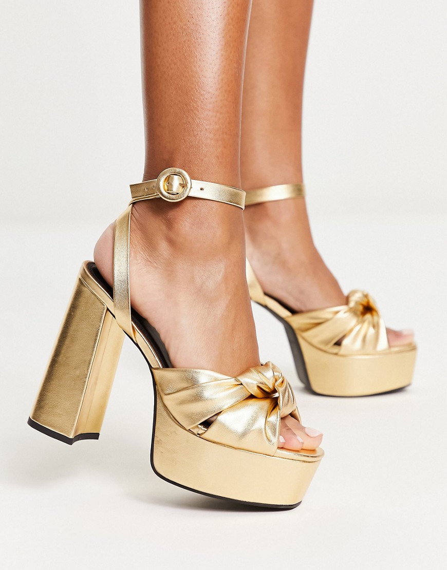 ASOS DESIGN Natia knotted platform heeled sandals in gold