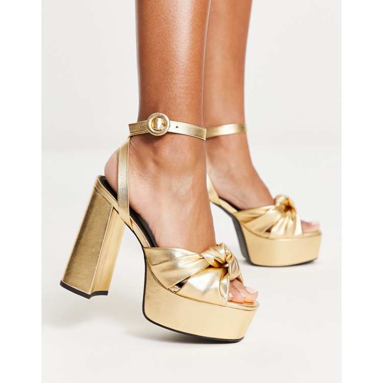 ASOS DESIGN Natia knotted platform heeled sandals in gold ASOS