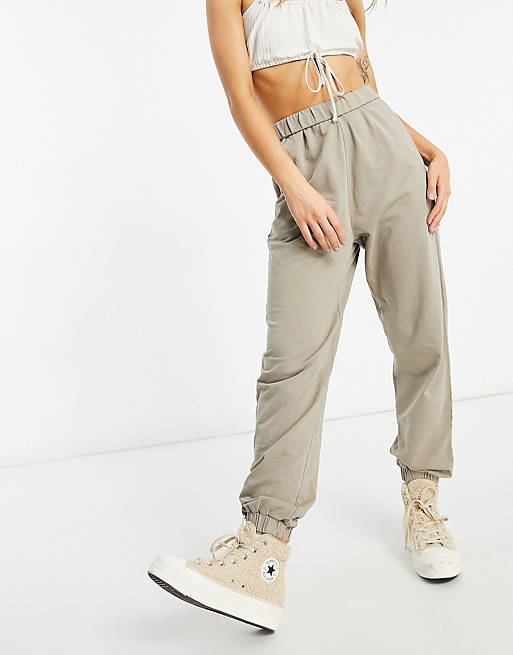 ASOS DESIGN natural dye oversized sweatpants with roll waist in khaki ...