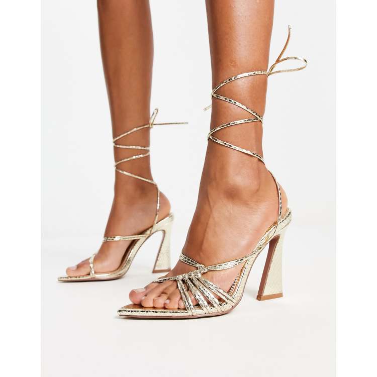 ASOS DESIGN Navarro pointed high heeled sandals in gold ASOS