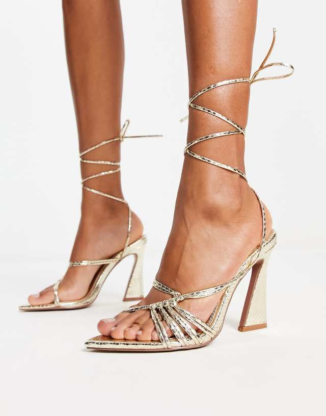 ASOS DESIGN Navarro pointed high heeled sandals in gold