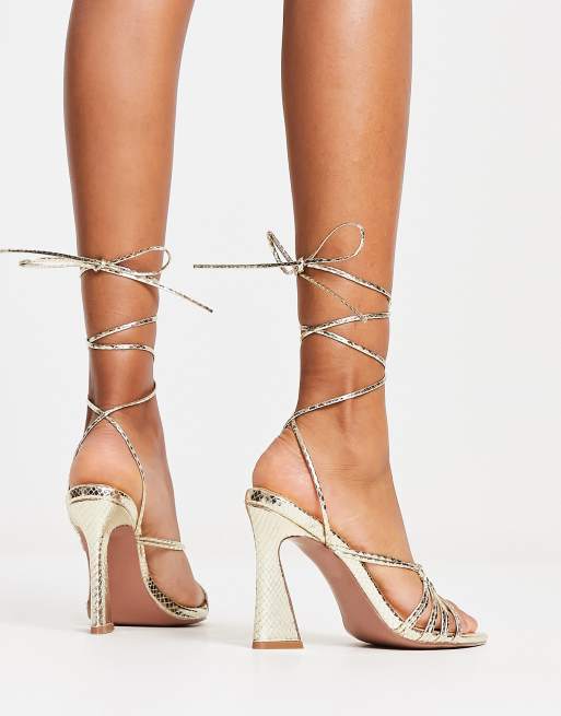 ASOS DESIGN Navarro pointed high heeled sandals in gold ASOS