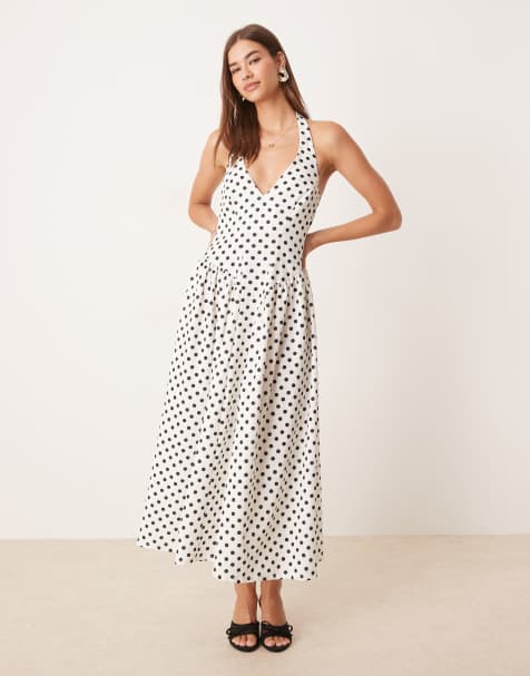 ASOS DESIGN – Neckholder-Midikleid mit Punktemuster, Godet-Rock und Korsett-Detail - view 1