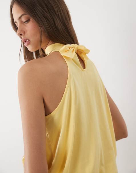 ASOS DESIGN – Neckholder-Oberteil in Buttermilchgelb mit Ballonsaum - view 1