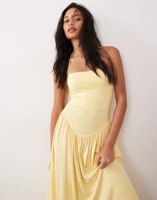 ASOS DESIGN - Neckholder-Sommerkleid in Gelb mit tiefer Taille