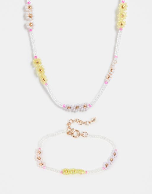 ASOS DESIGN necklace and bracelet set with pretty flower beads