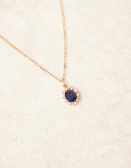 ASOS DESIGN necklace faux crystal pendant in blue and gold  , 2 of 3
