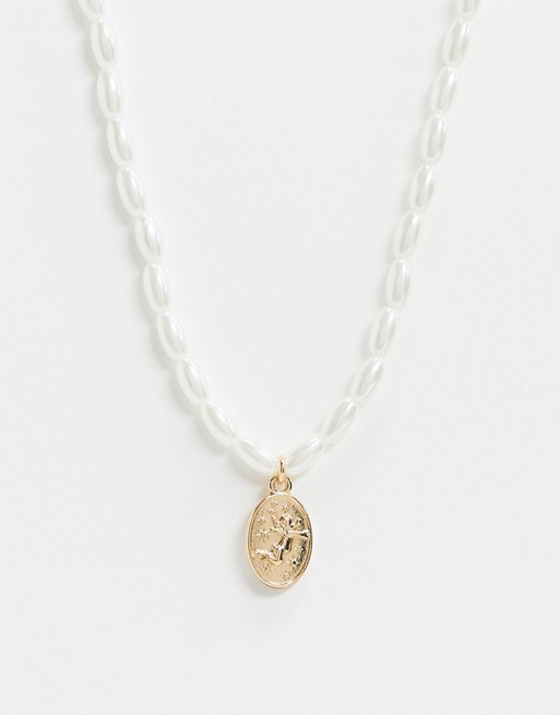 ASOS DESIGN necklace in pearl with cupid coin pendant in gold tone