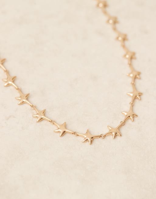 ASOS DESIGN necklace in starfish design in brushed gold tone