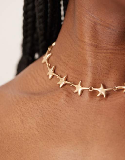 ASOS DESIGN necklace in starfish design in brushed gold tone