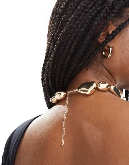 ASOS DESIGN necklace with abstract bead design in gold tone | ASOS