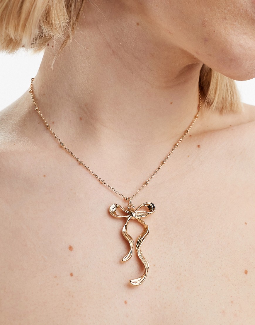 Asos Design Necklace With Bow Charm In Gold Tone