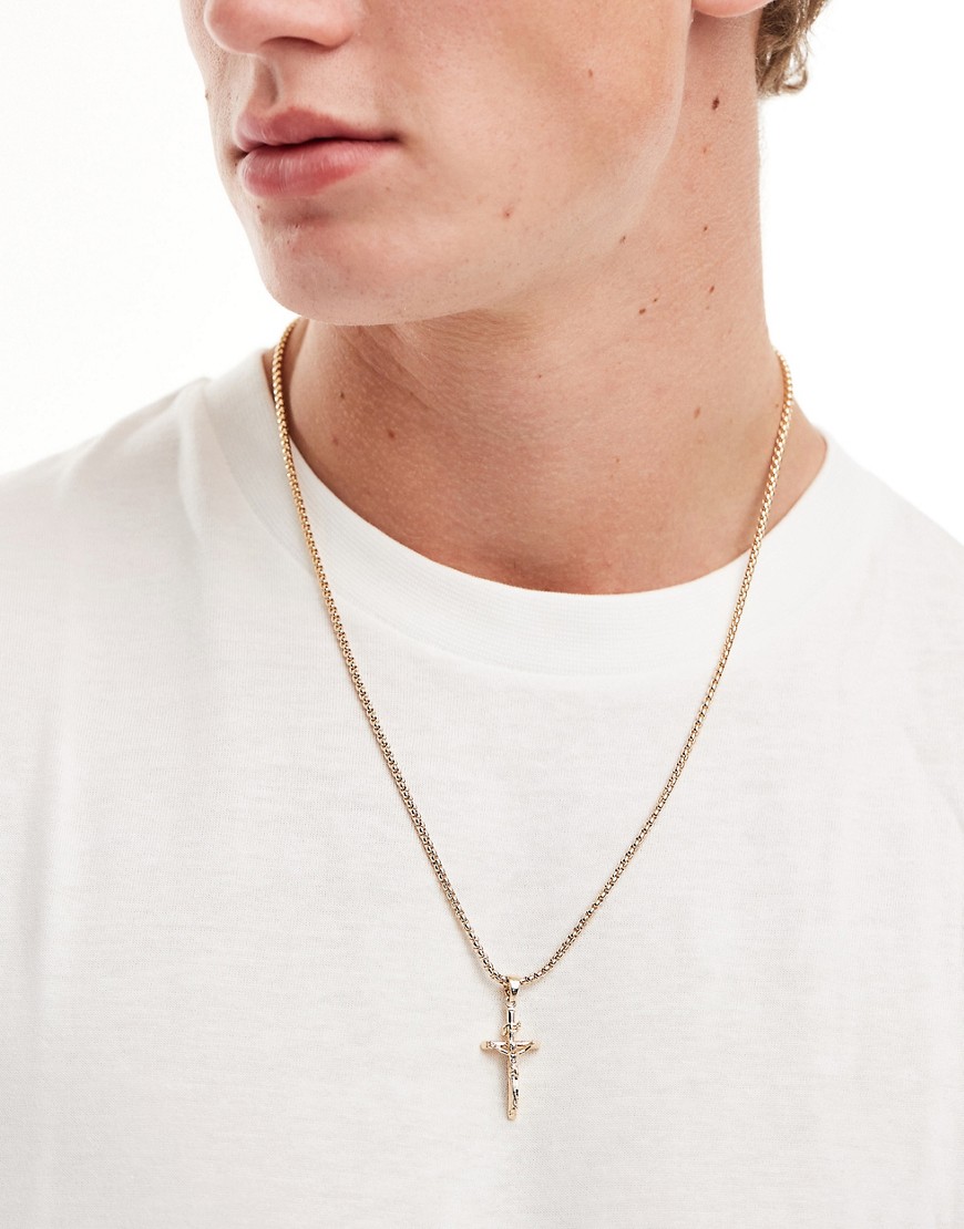 necklace with cross pendant in gold tone