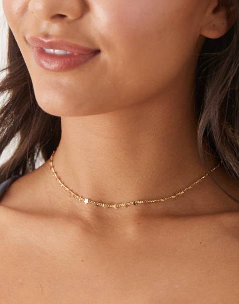 ASOS DESIGN necklace with dainty moon and star detail in gold tone - view 1