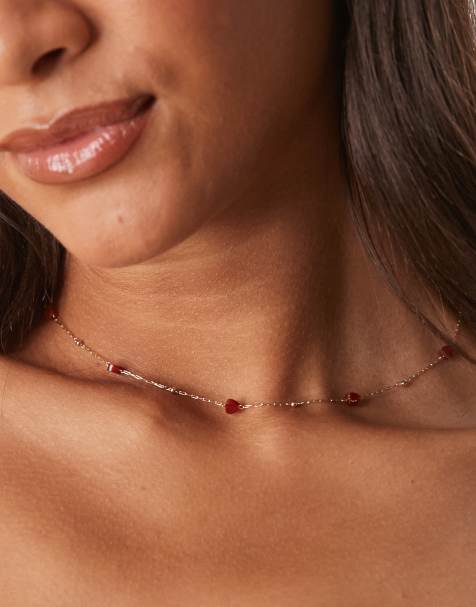 ASOS DESIGN necklace with gold tone fine chain and red semi-precious stone hearts - view 1