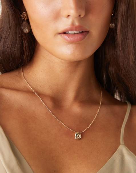 ASOS DESIGN necklace with knot pendant in gold tone - view 1