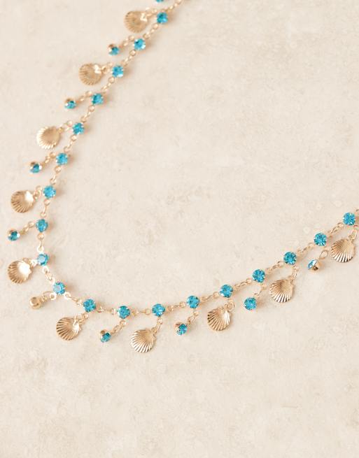 ASOS DESIGN necklace with mini gold tone shell and blue faux crystal droplets, 2 of 3