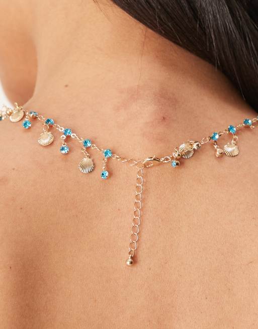 ASOS DESIGN necklace with mini gold tone shell and blue faux crystal droplets, 3 of 3