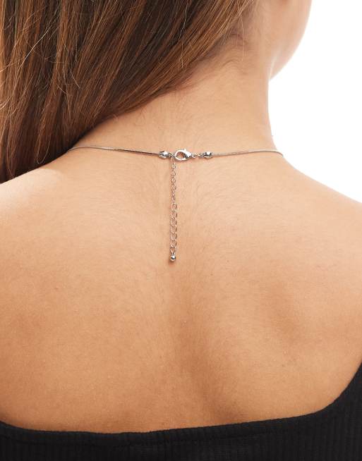 ASOS DESIGN necklace with molten pebble pendant in silver tone, 2 of 3