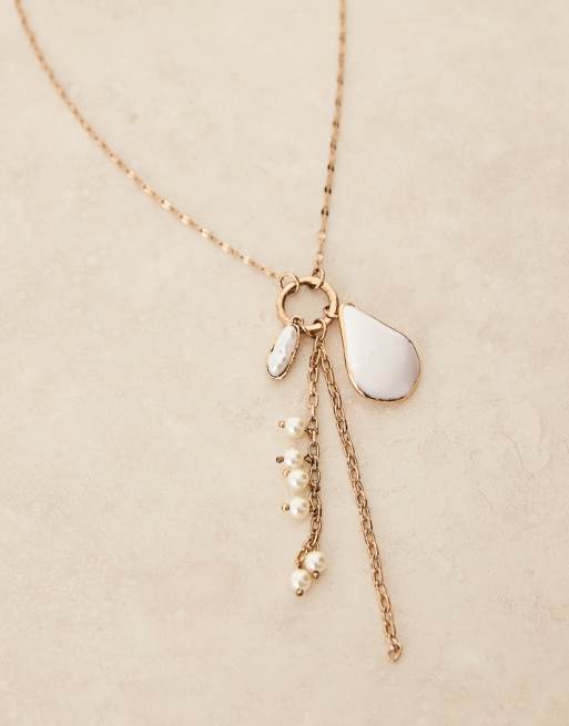 ASOS DESIGN necklace with multi-charm drops in gold tone