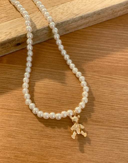 Pearl necklace deals with gold charm