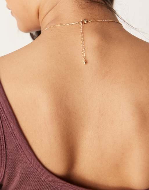 ASOS DESIGN necklace with pink semi precious quartz heart pendant in gold tone, 3 of 3