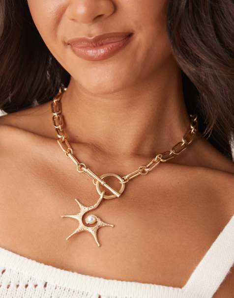 ASOS DESIGN necklace with spikey sun t-bar design in gold tone - view 1